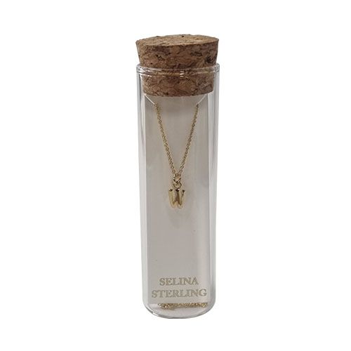 Selina gold-plated sterling silver letter W initial necklace in its cork-topped glass gift tube