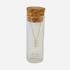 Selina gold-plated sterling silver letter Z initial necklace in its cork-topped glass gift tube