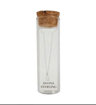 Selina sterling silver letter B initial necklace in its cork-topped glass gift tube