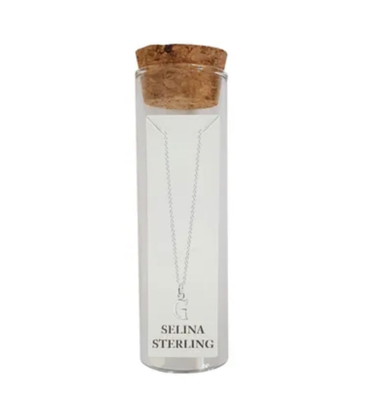 Selina sterling silver letter G initial necklace in its cork-topped glass gift tube