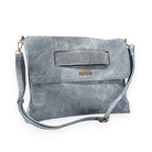 Denim ShineEdge carrier in washed blue-grey with a sparkly studded strip across the flap, a gold-tone logo plate and a long matching strap