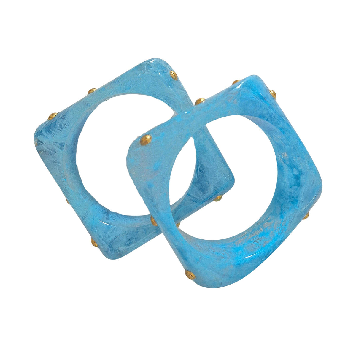 Two marbled blue resin bangles with metal studs, shown overlapping.