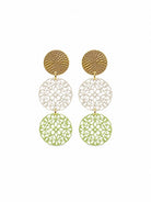 Pair of long drop earrings: a textured gold-tone disc, a white filigree disc and a soft lime filigree disc