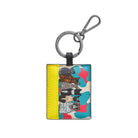 Cat Club keyring: a column of cats in different coats on coral, aqua and cream camouflage, beside a yellow panel, on a gunmetal ring and clip.