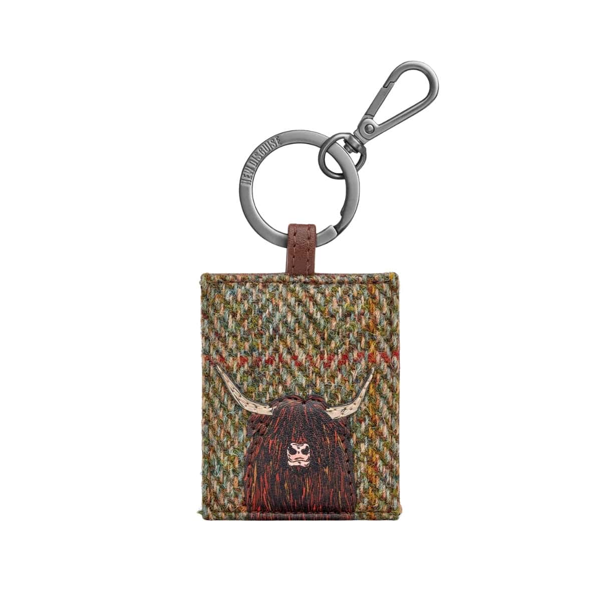 Highland Cow Green/Brown keyring: a shaggy dark brown Highland cow with pale horns on a green and brown woven tweed front, on a gunmetal ring and clip.