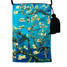 Velour shoulder pouch printed with Van Gogh's Almond Blossom on deep blue, with a black cord strap and tassel.