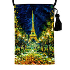 Velour shoulder pouch printed with the Eiffel Tower at night between lamplit trees, with a black cord strap and tassel.
