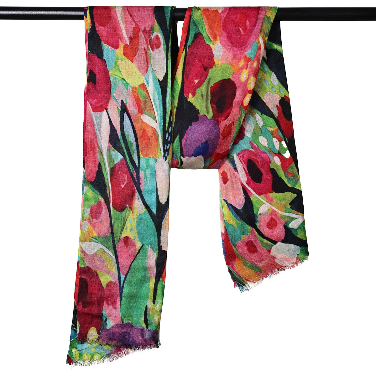 The Wildflower Carnival scarf hanging over a rail, showing the full floral print