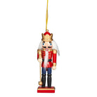 Wooden nutcracker ornament in a red coat with a gold crown and sceptre, on a gold cord loop.