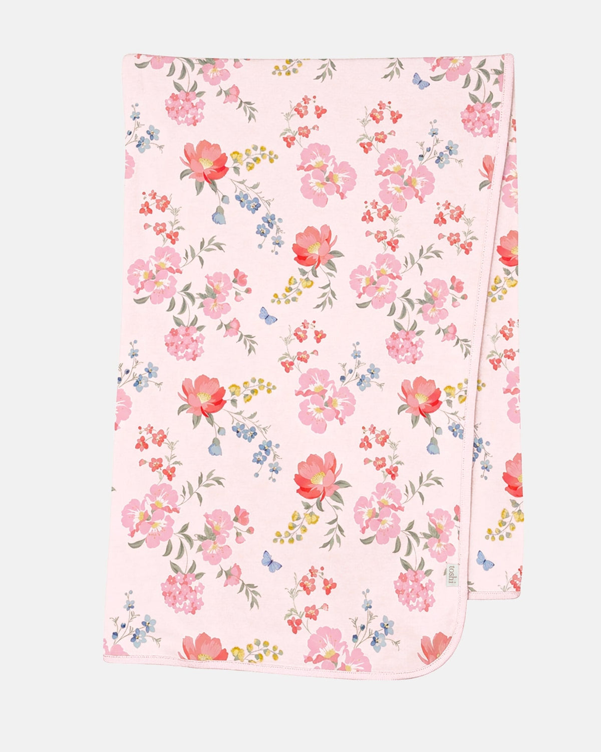 Toshi Arcadia Wild Garden knit wrap laid flat, pale pink jersey printed with pink and coral florals, small blue sprigs and butterflies