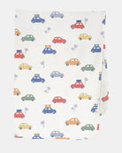 Toshi Arcadia Big Mini muslin wrap in white cotton printed with colourful vintage cars and palm trees, folded
