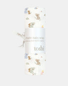 The Gumnut Babies wrap rolled in its Toshi muslin wrap band with a ribbon tie