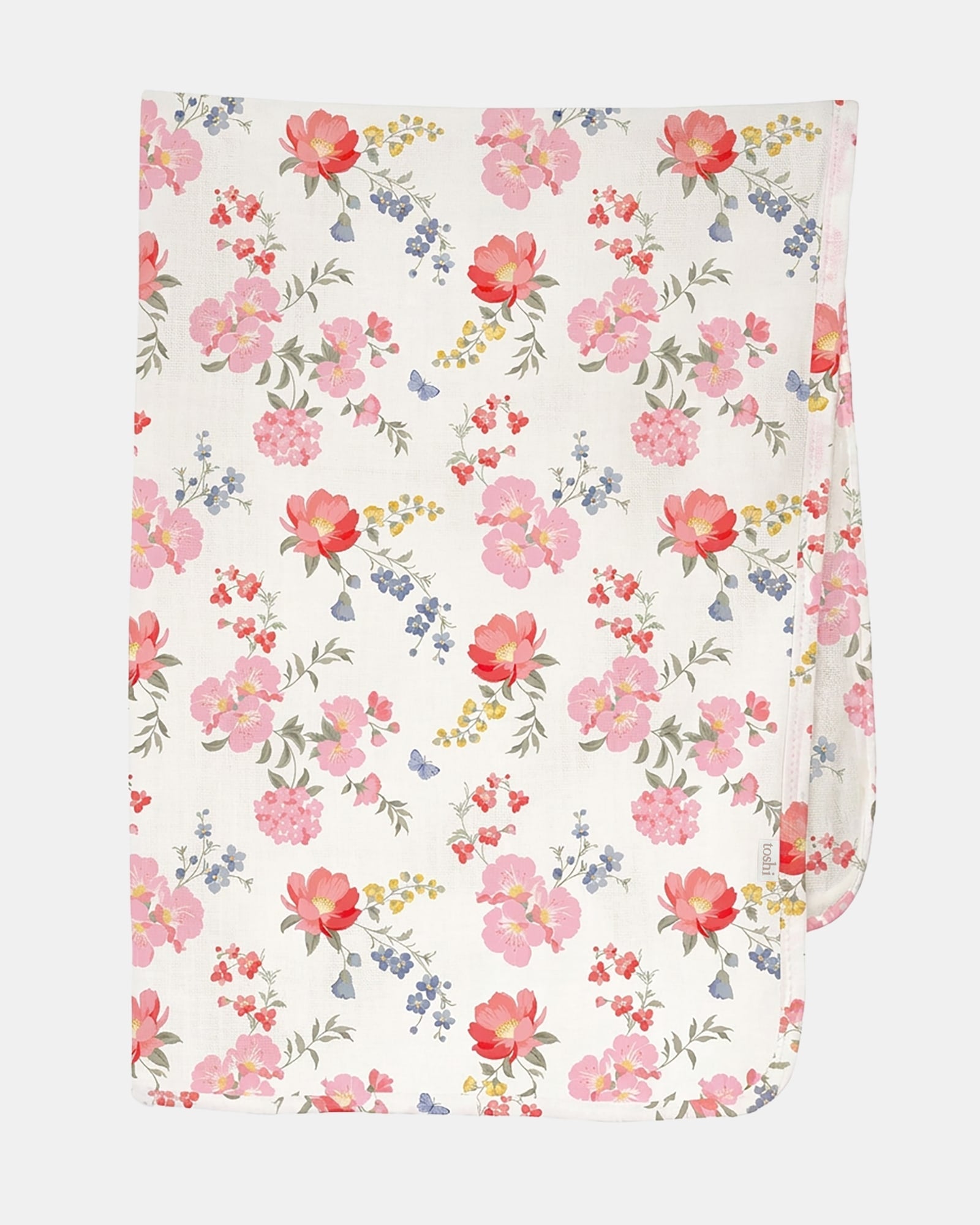 Toshi Arcadia Wild Garden muslin wrap in white cotton printed with pink and coral florals with blue blooms, folded