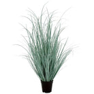Faux grass plant with fine arching green blades in a plain black plastic pot