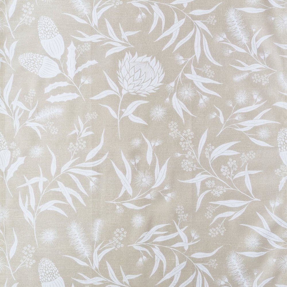 Close-up of the Bindi print with white Australian native flora on a beige ground