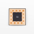 Top view of the Planet Finska chess board in its charcoal gift box