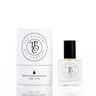 The Perfume Oil Company white gift cylinder beside a 10 ml bottle of perfume oil, studio lit on white